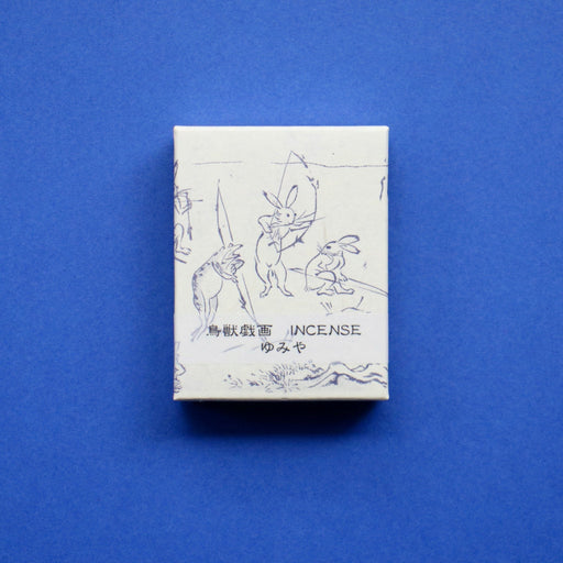 Japanese Incense Sticks - Bow & Arrow on blue backdrop.