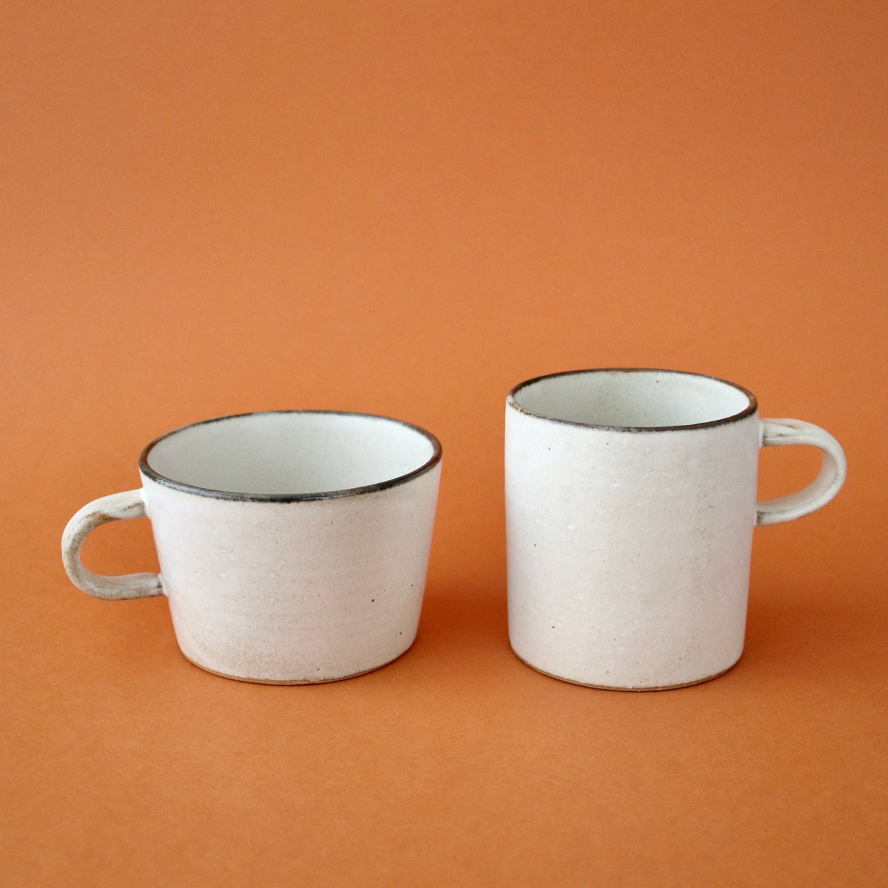 Japanese Ceramic Birch Cup against orange backdrop.