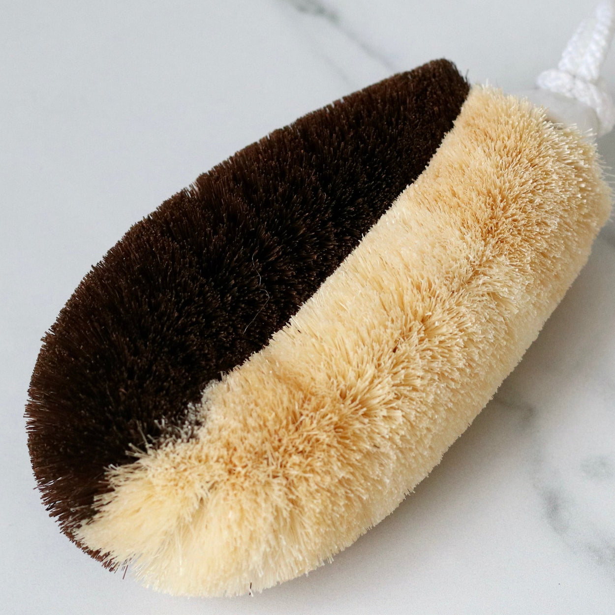 Close up of Japanese two toned natural body scrub brush