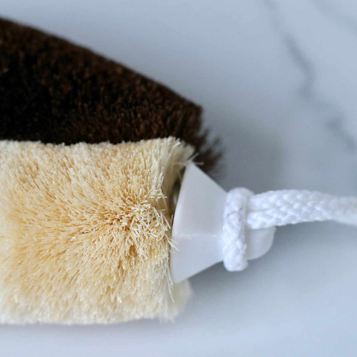 Close up of Japanese two toned natural body scrub brush