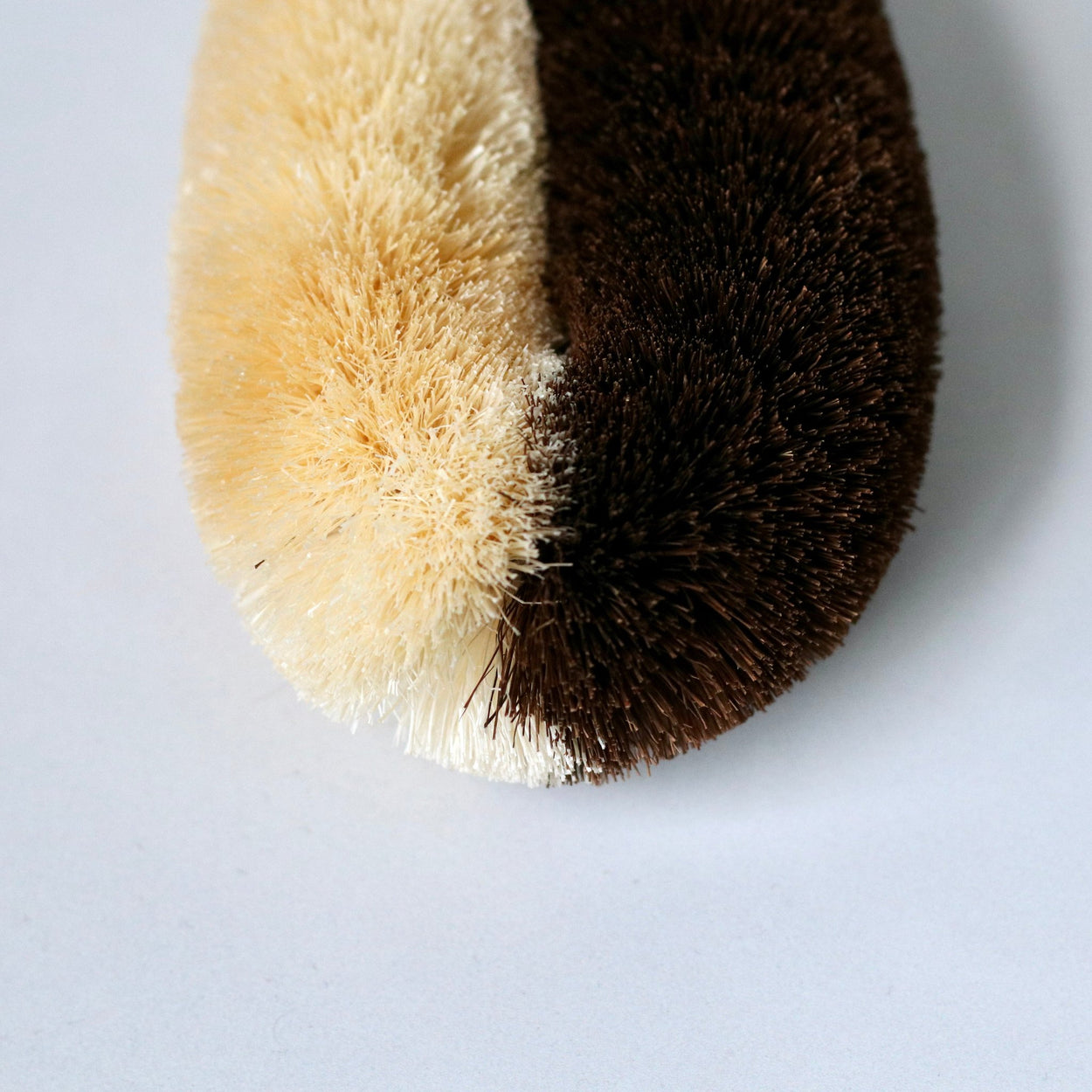 Close up of Japanese two toned natural body scrub brush