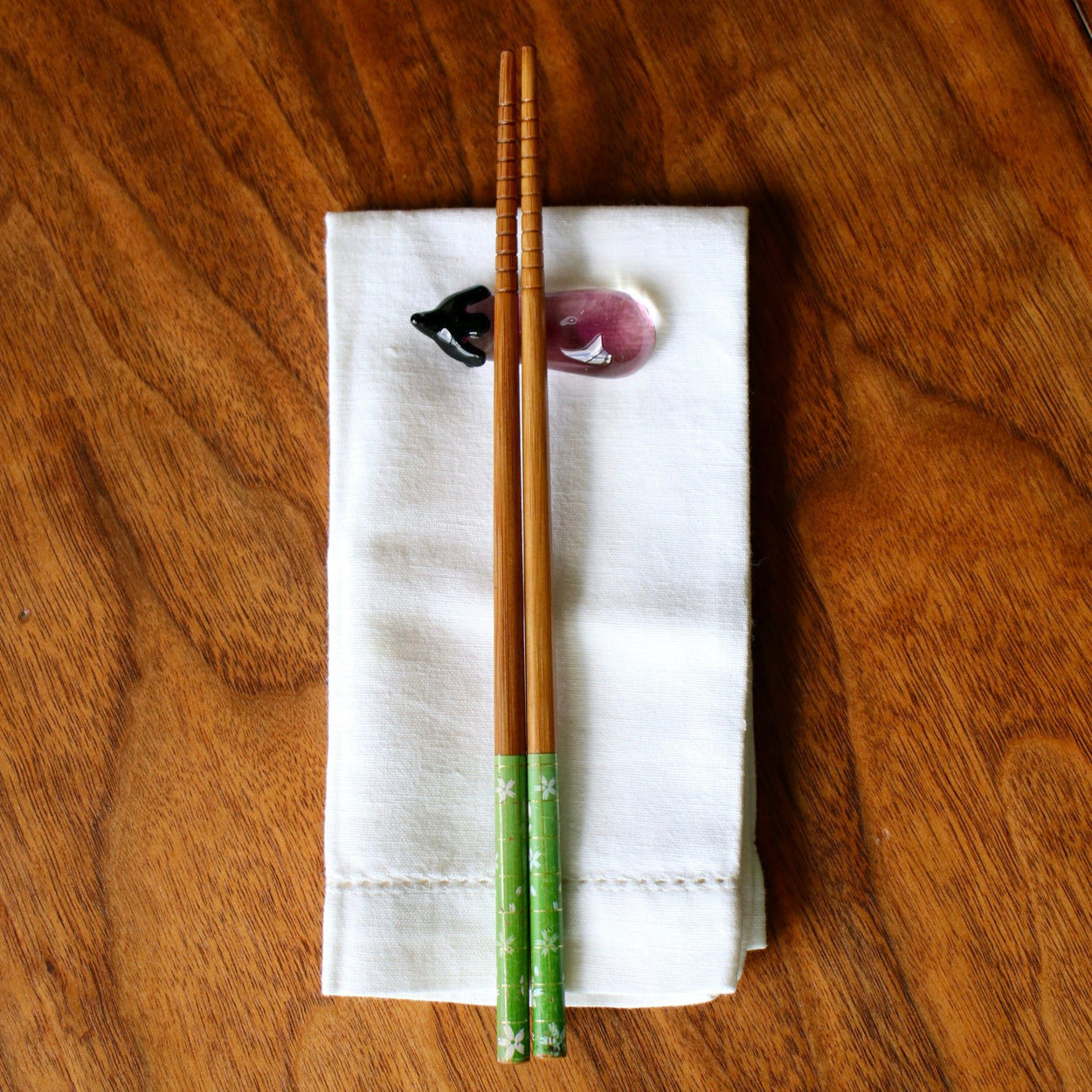 Vegetable Chopstick/Knife Rest, eggplant with chopsticks on napkin