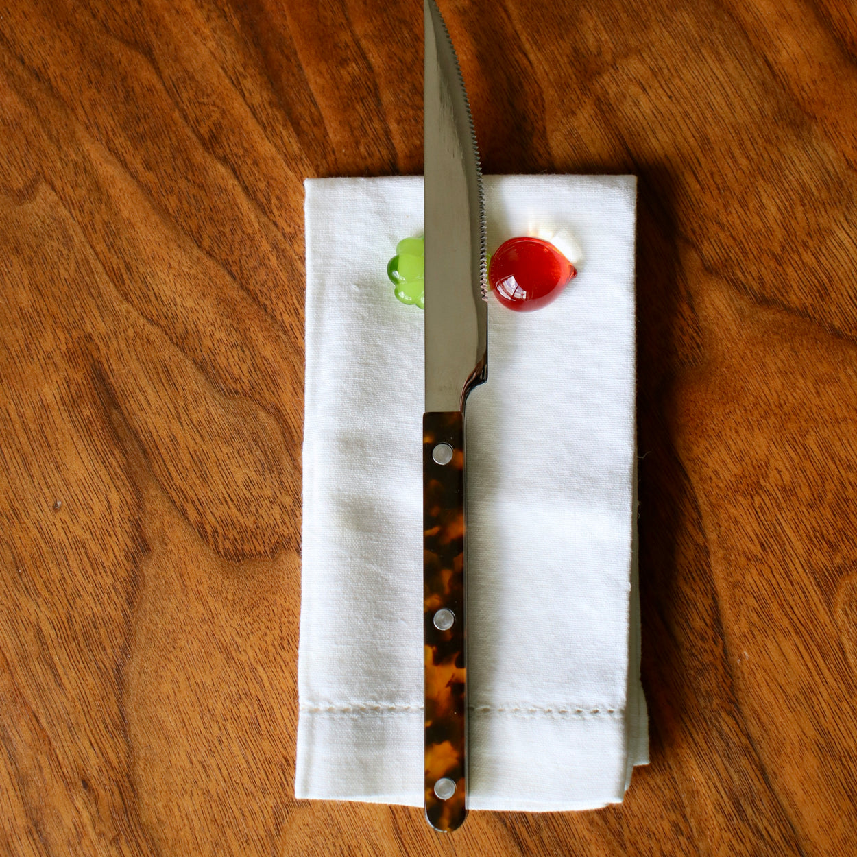 Vegetable Chopstick/Knife Rest, radish with knife on napkin