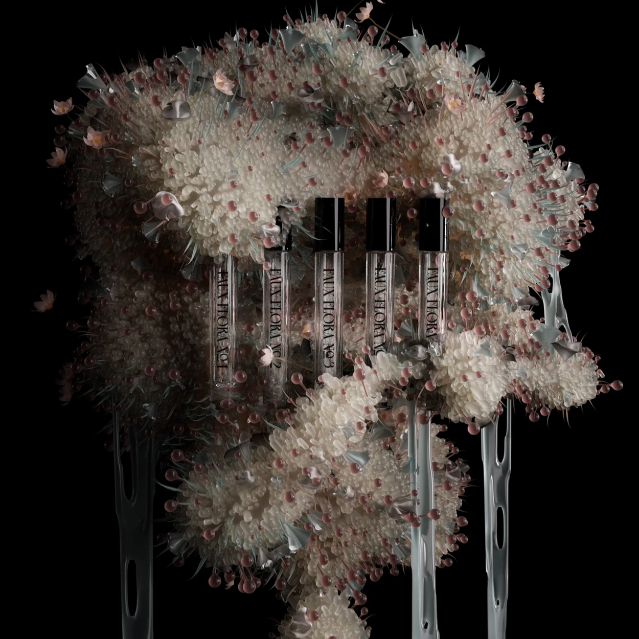 Vials of perfume arranged to form a mass with floral and crystal elements on a black background