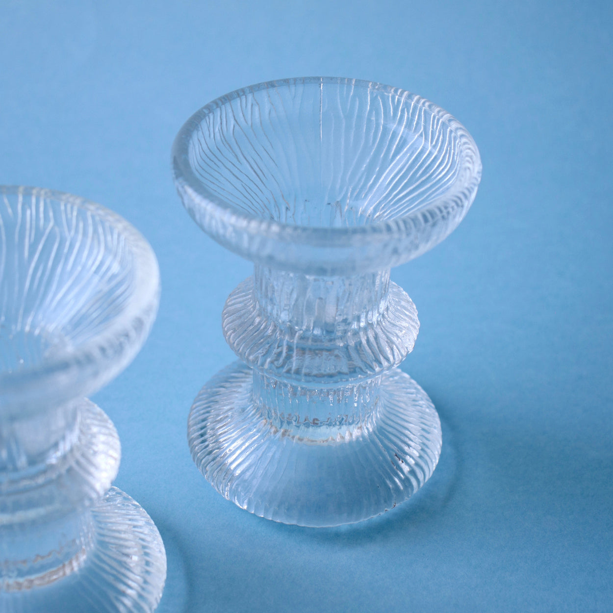 Close up of Vintage Mid Century glass candlesticks