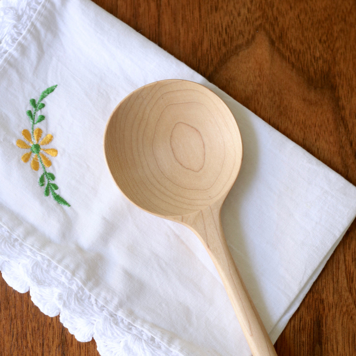 Close up of Hand crafted maple wood spoon