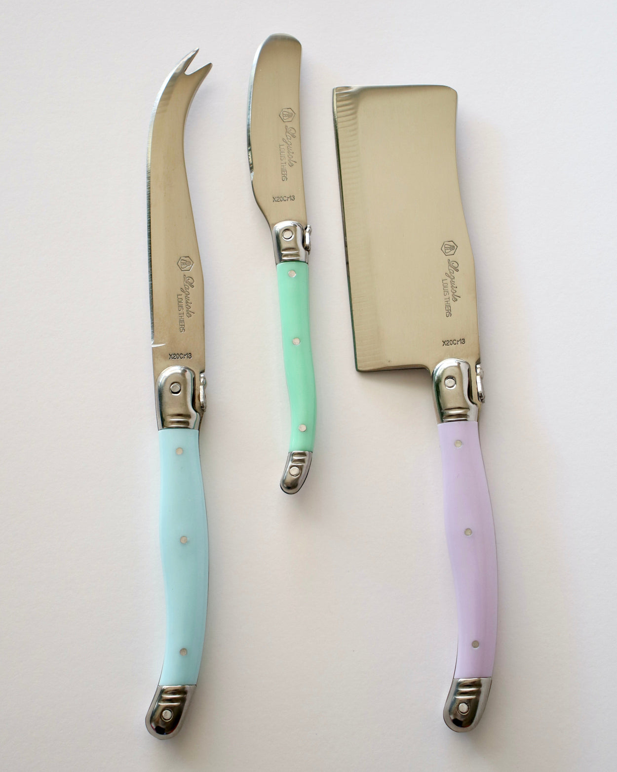 Vintage Laguiole Cheese serving set against whitebackground