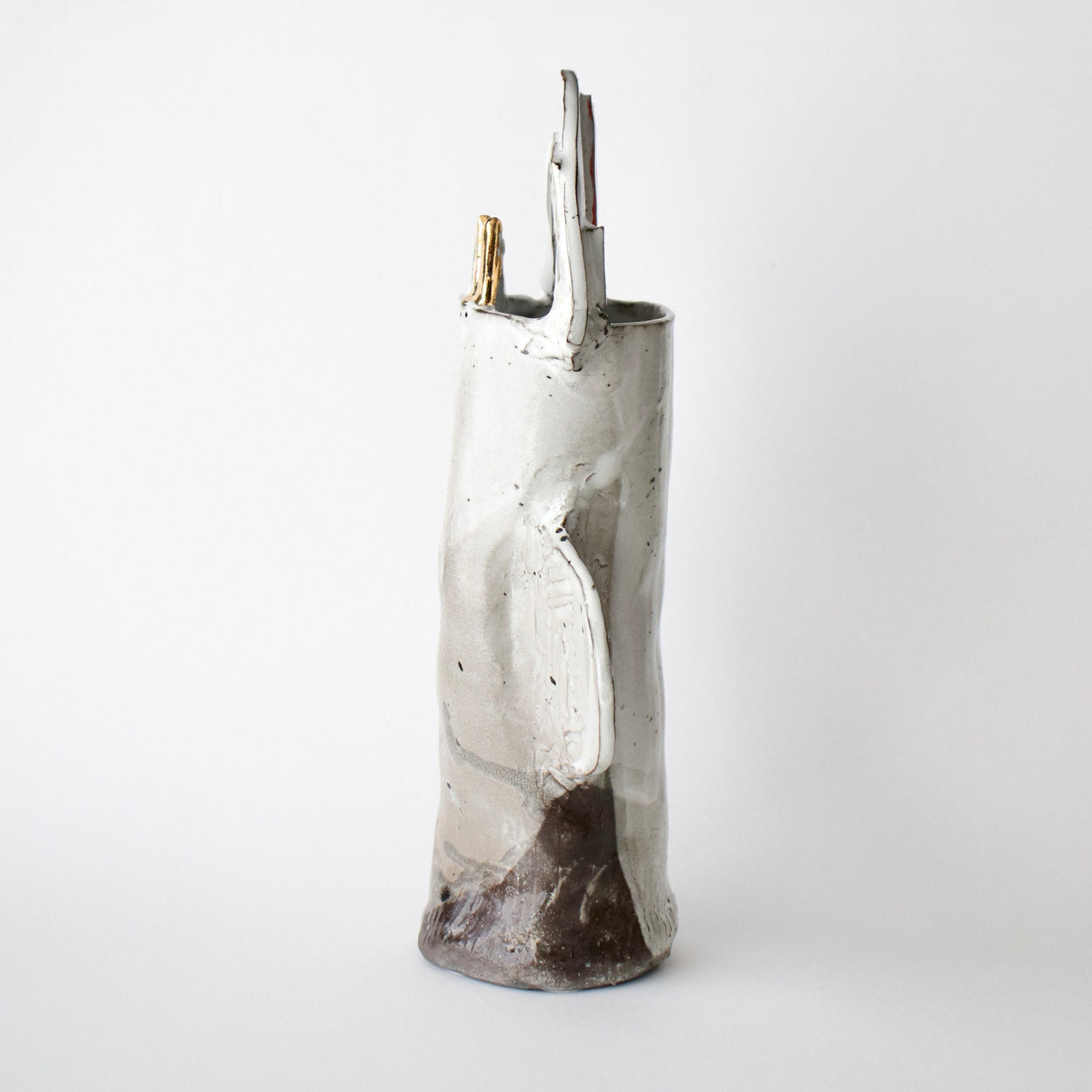 Ceramic vase with abstract design on a white background