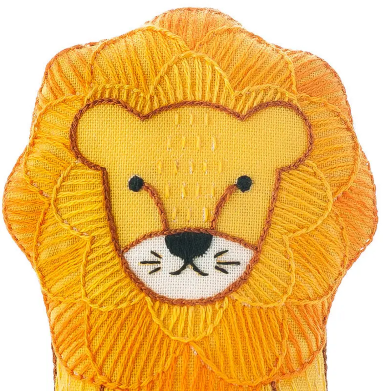Embroidered lion face patch on a white background