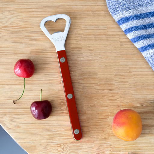 Sabre Paris bottle opener on wooden table