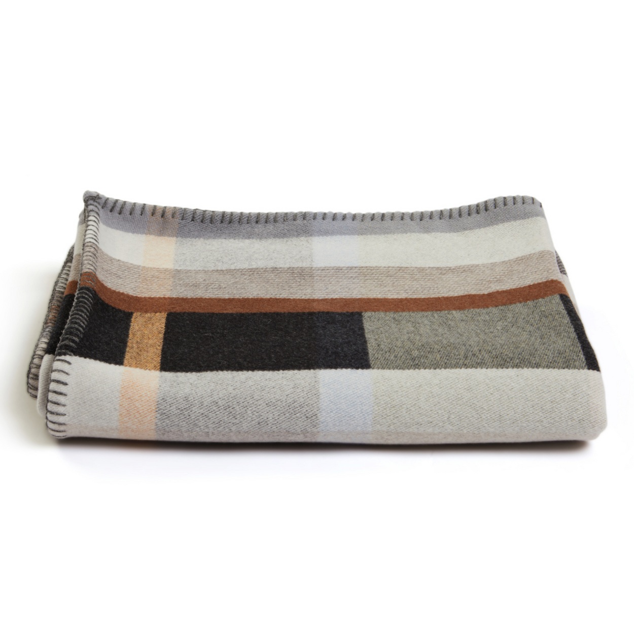 Wallace Sewell Premium Chippendale Merino lambswool throw in pale brown tones, folded.