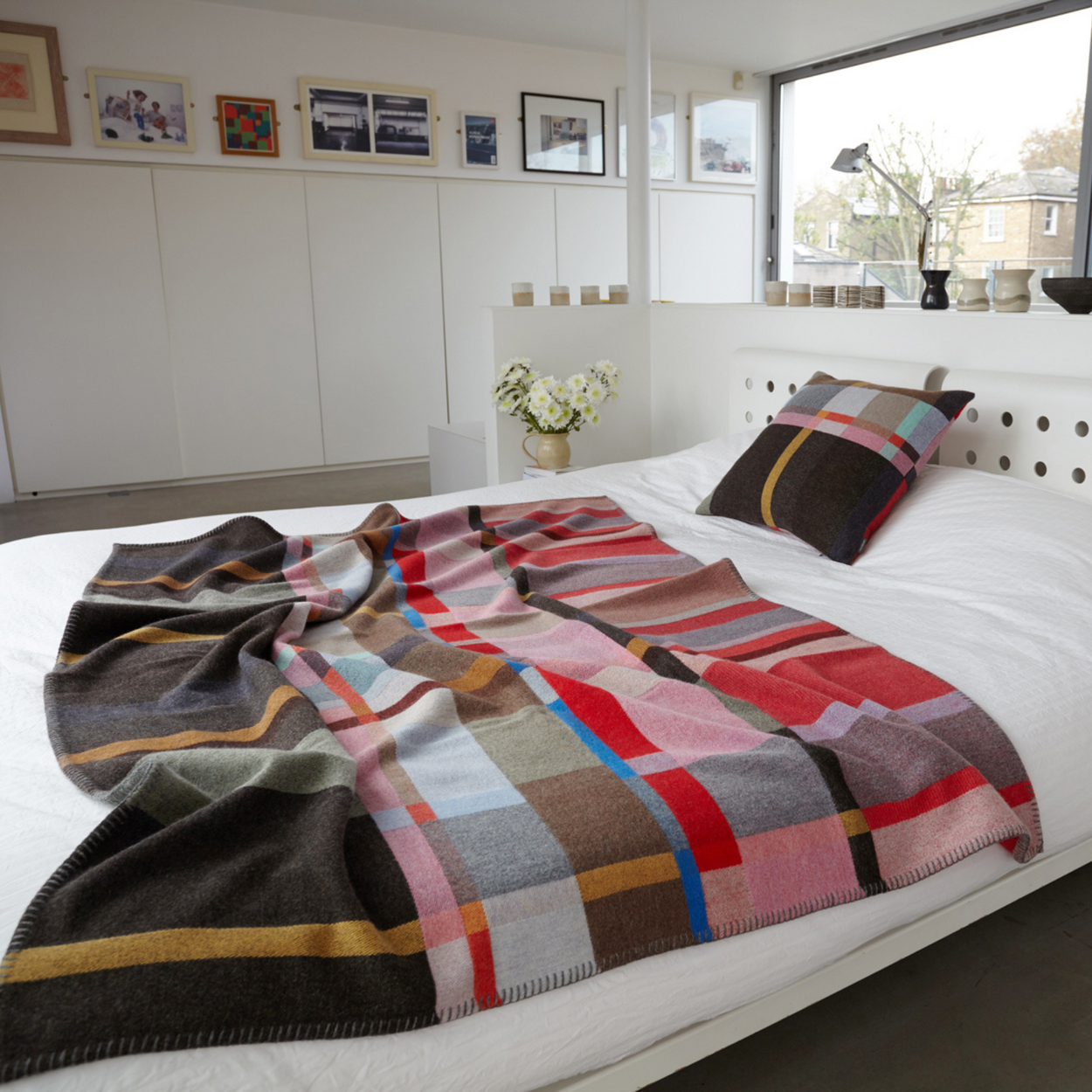 Wallace Sewell Premium Lasdun Merino Lambswool blanket draped on bed