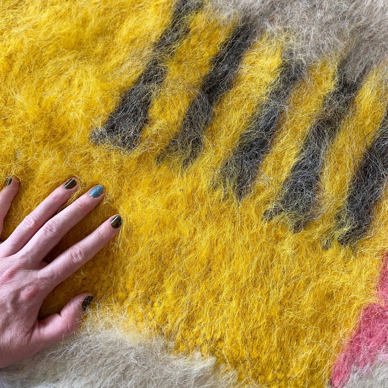 Close up Bauhaus Hand Woven Pure Wool Area Rug close up with hand