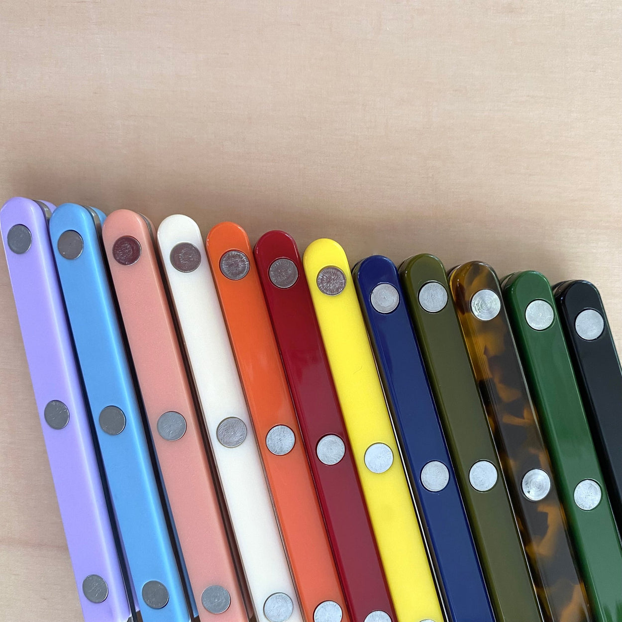 Sabre Paris Bistrot Butter Spreader in 12 colours, handle close ups.