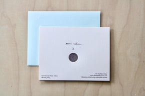 Tiger Letterpress Greeting Card -back - with pale blue envelope on pale wood.