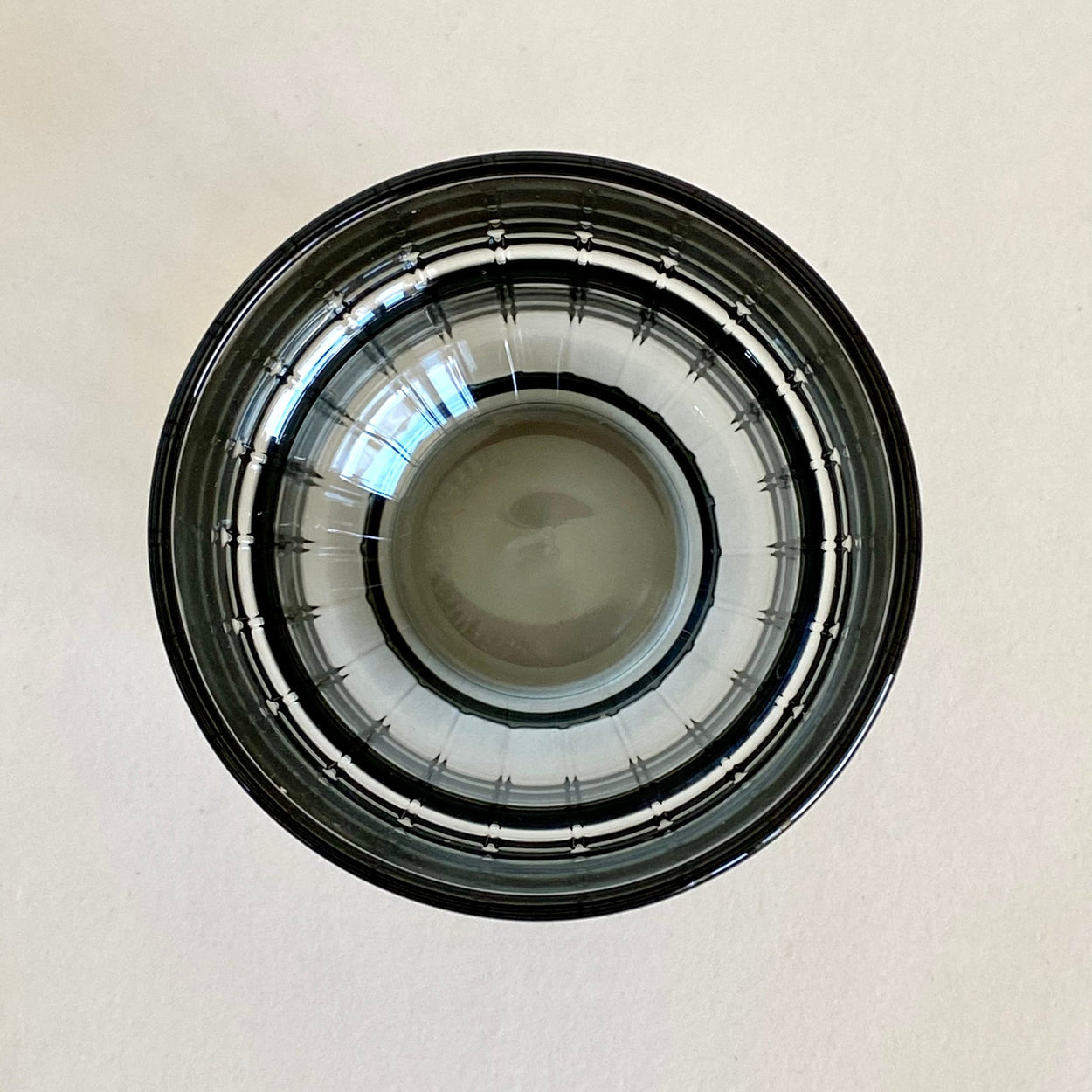 Smoky Grey Portuguese glass with white background, viewed from above.