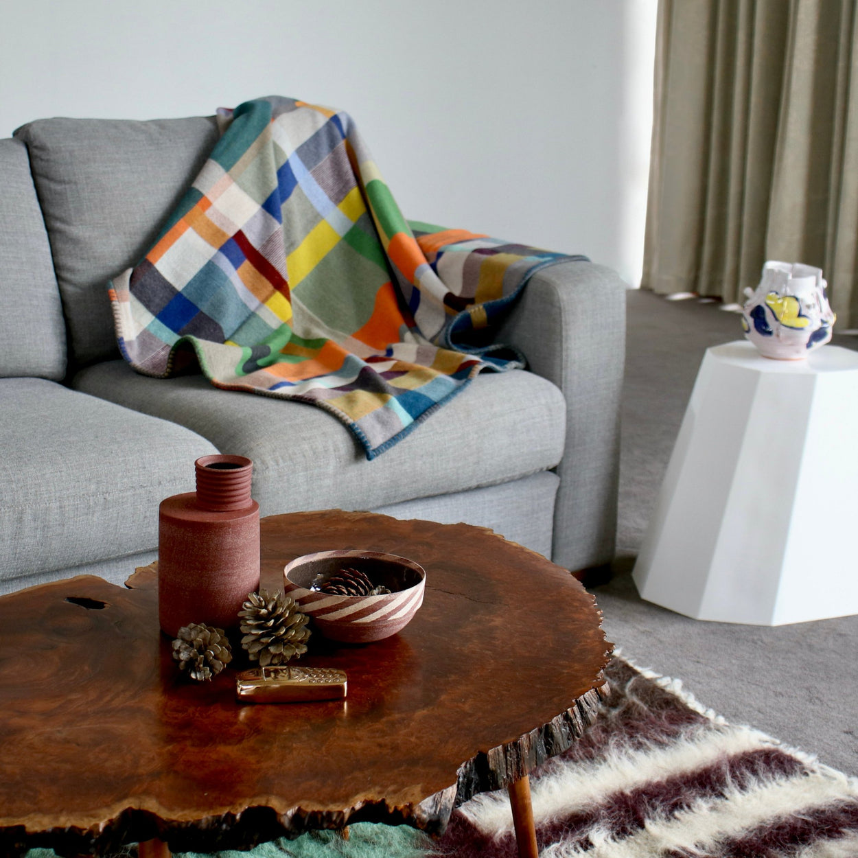 Handmade Ceramic Vase and bowl by Amanda-Sue Rope, on burl wood coffee table in bright lounge room