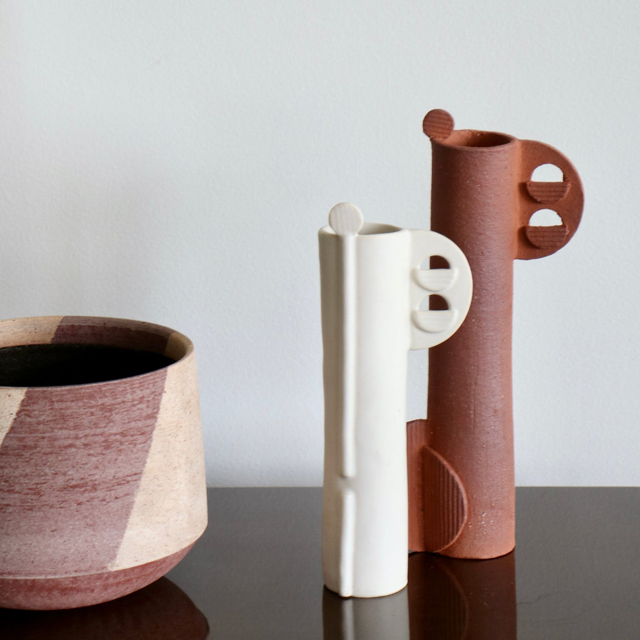 Cassie Hansen Tall Sculpture with white scuplture and striped bowl by Amanda Sue Rope