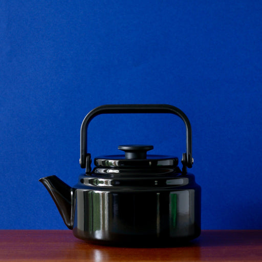 Noda Horo Amu Kettle Black against blue background