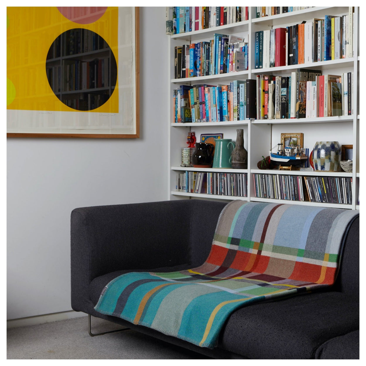 Wallace Sewell Fieldon blanket on a couch.