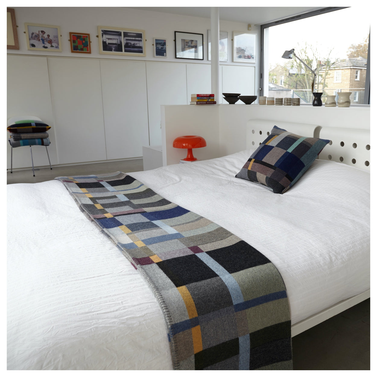 Premium Merino Lambswool throw blanket - Erno Blue, Grey & Grape block across a bed