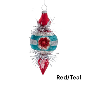 Decorative Christmas ornament with red and teal colors on a white background