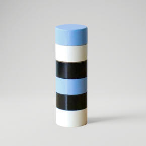 Cylindrical Semi D salt pepper grinder with blue, white, and black stripes on a gray background