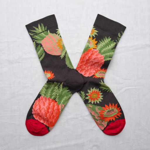 Bonne Maison Pineapple socks against a white backdrop.