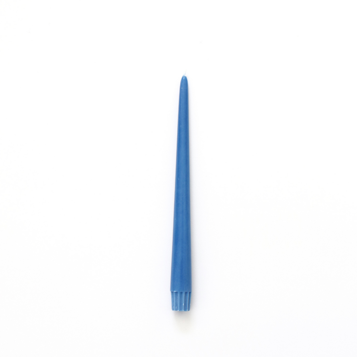 A single Capri Blue candle, centered on a plain white background.
