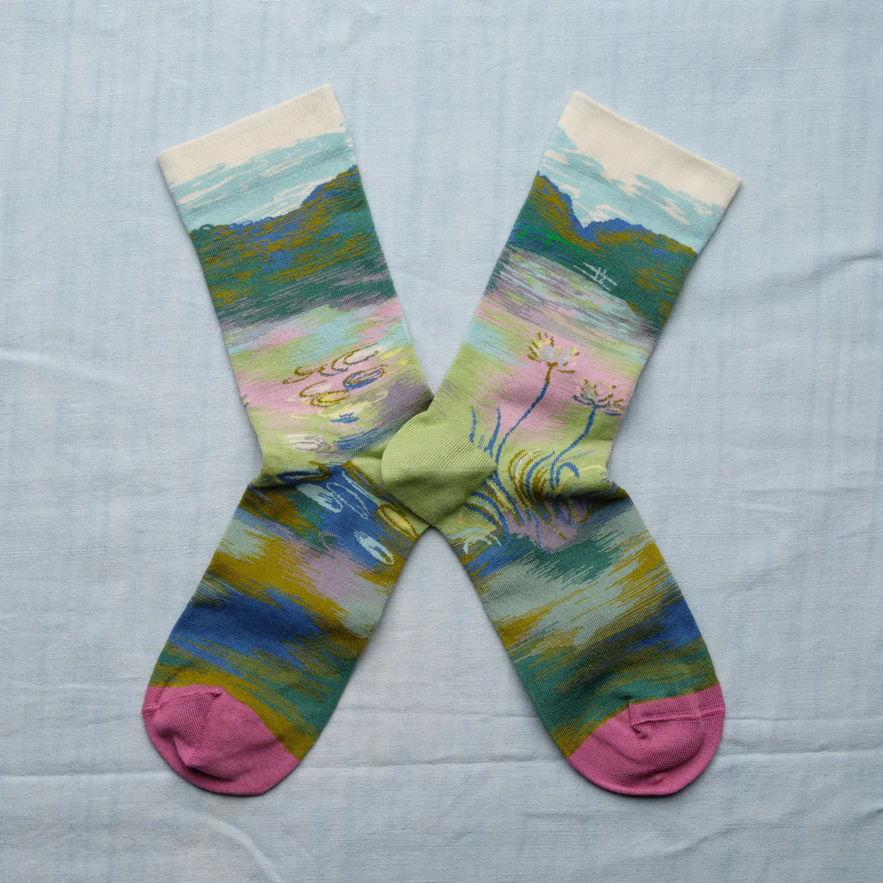 Garden Bonne Maison socks on white backdrop.