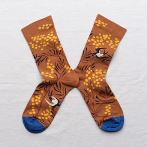 Caramel Mimosa Bonne Maison socks on white backdrop.
