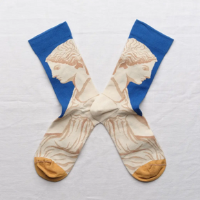 Statue Bonne Maison socks on white backdrop.