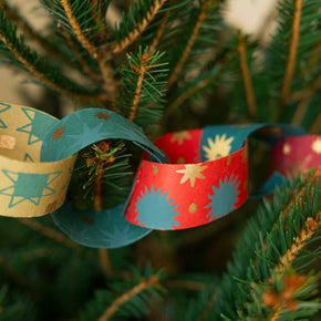 Colorful paper chains on a Christmas tree