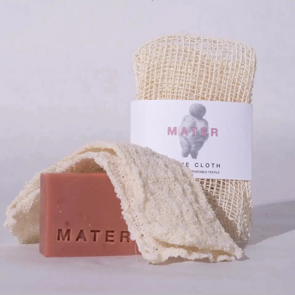 Mater pink soap and Agave Cloth wrapped and folded on grey background