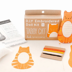 D.I.Y Embroidered Doll Kit for tabby cat with materials and instructions on a white background