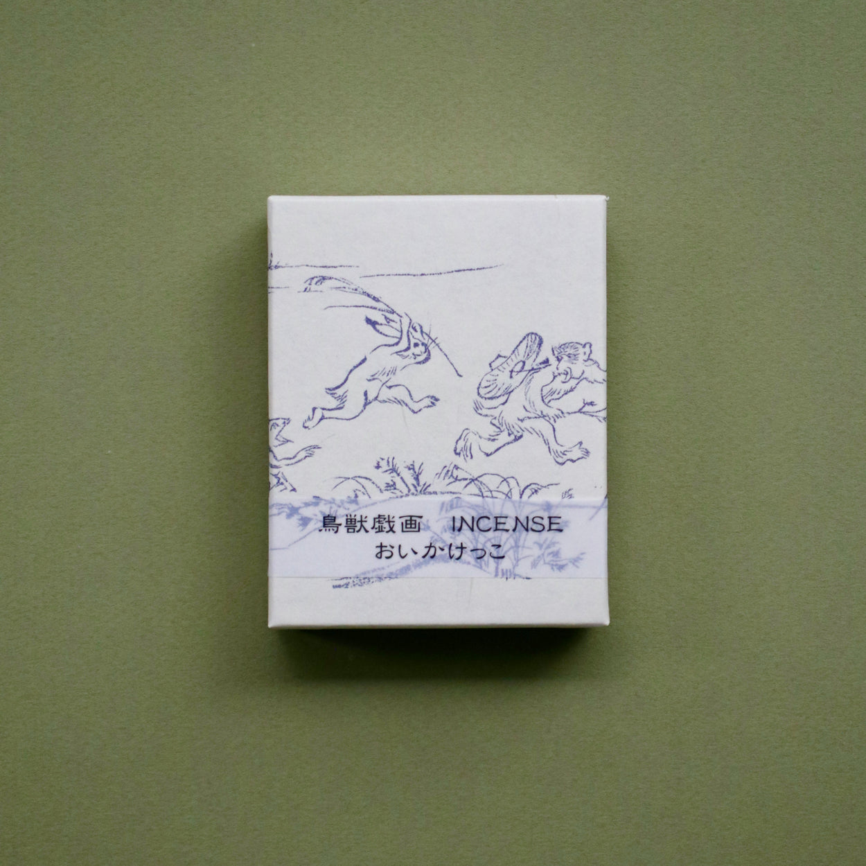 Japanese Incense Sticks - Catch box on green backdrop.