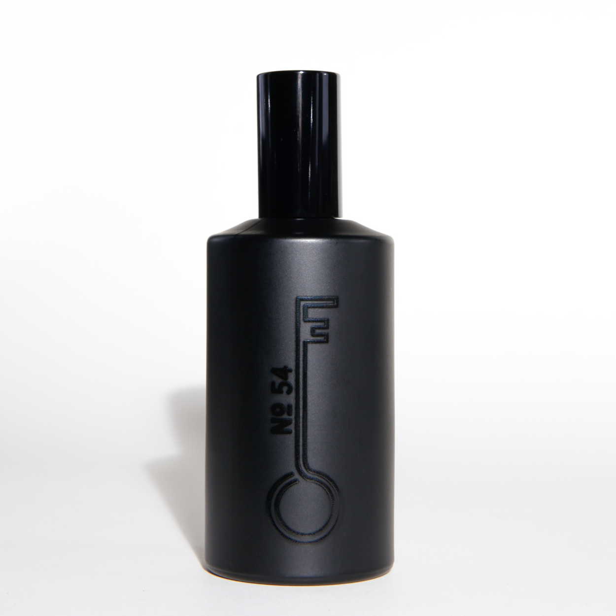 Black perfume bottle with a unique design on a white background