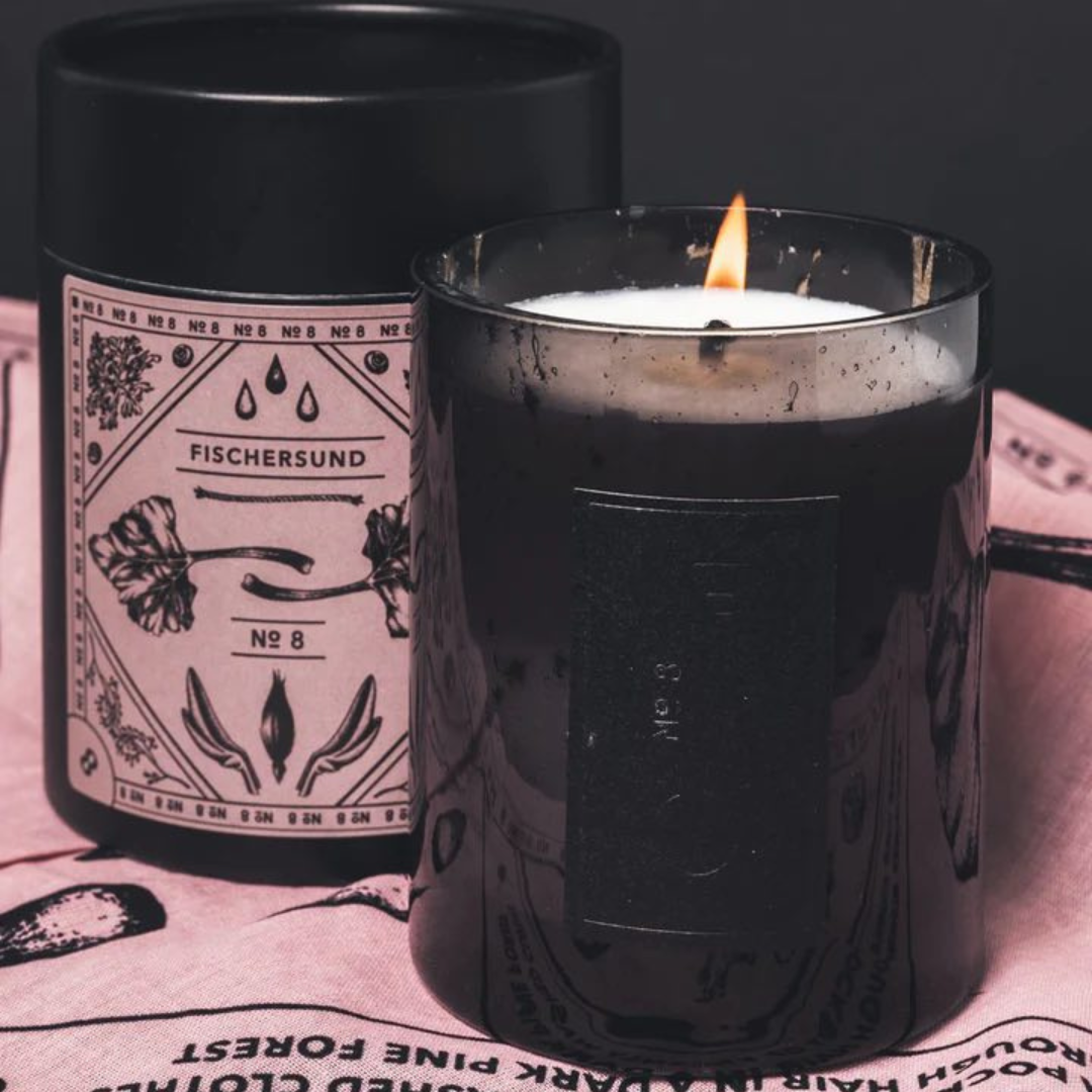 Fischersund No.8 candle burning with pink bandana and gift box