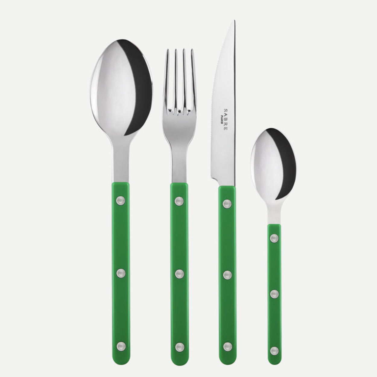 Set of stainless steel Sabre Paris cutlery with grass green handles on a white background