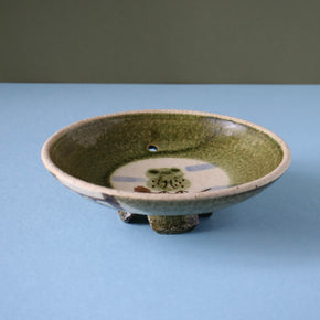 Vintage Japanese owl bowl incense holder with blue background side profile