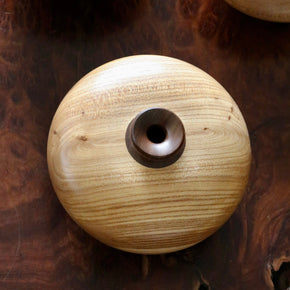 Vintage wood turned vase on wood table. viewed from above