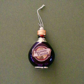 Balsamic vinegar bottle ornament on a plain background