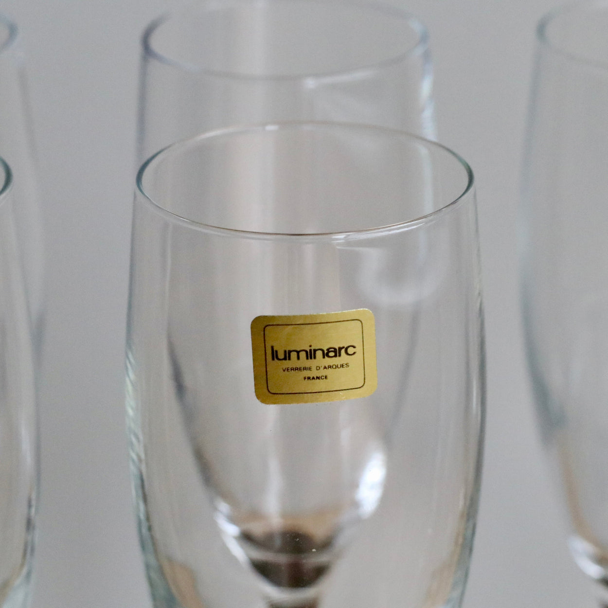 Clear glass with Luminarc label on a white background