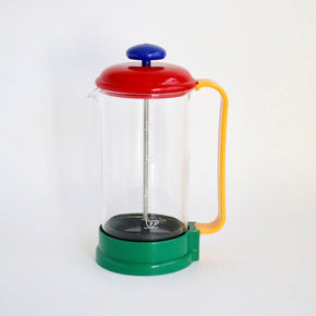 Colorful French press coffee maker on a white background