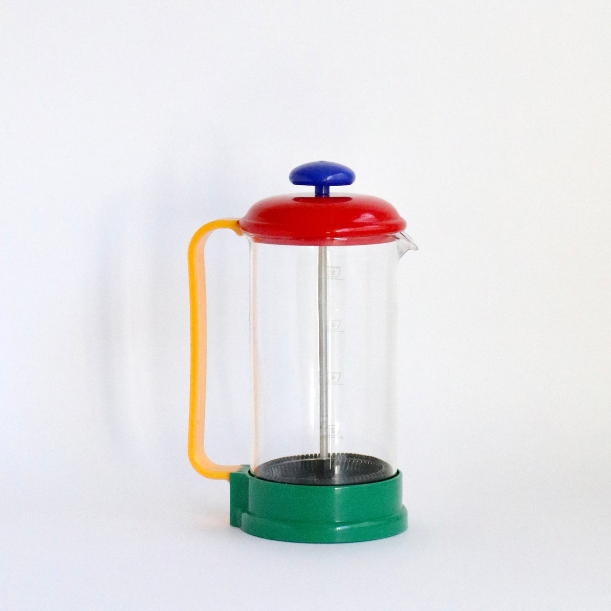 Colorful French press coffee maker on a white background