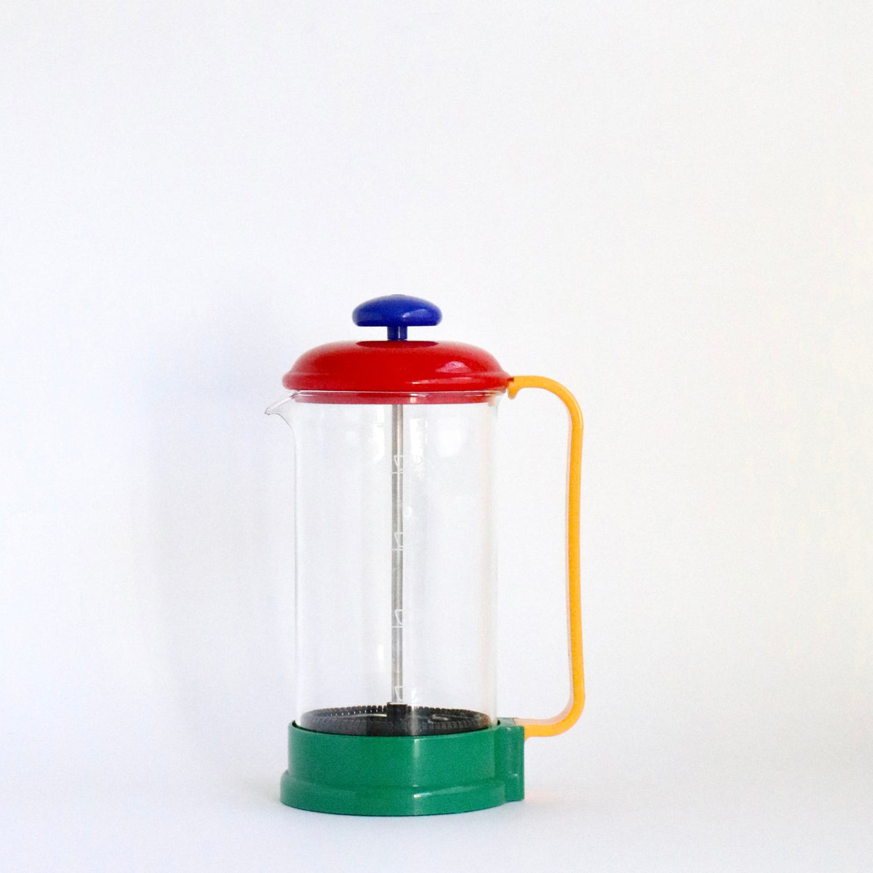 Colorful French press coffee maker on a white background