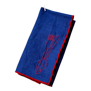 Blue napkin with red outline of a fork and knife on a white background