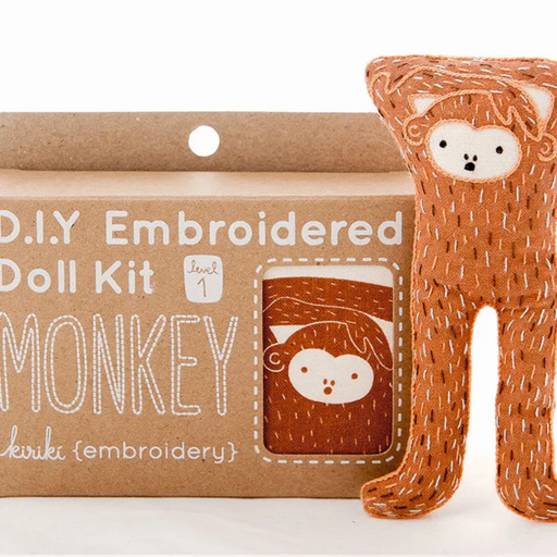D.I.Y Embroidered Doll Kit with a monkey design on a cardboard packaging