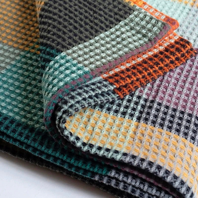 Folded close up of Mungo Vrou-Vrou cotton Waffle Blanket - Cypress