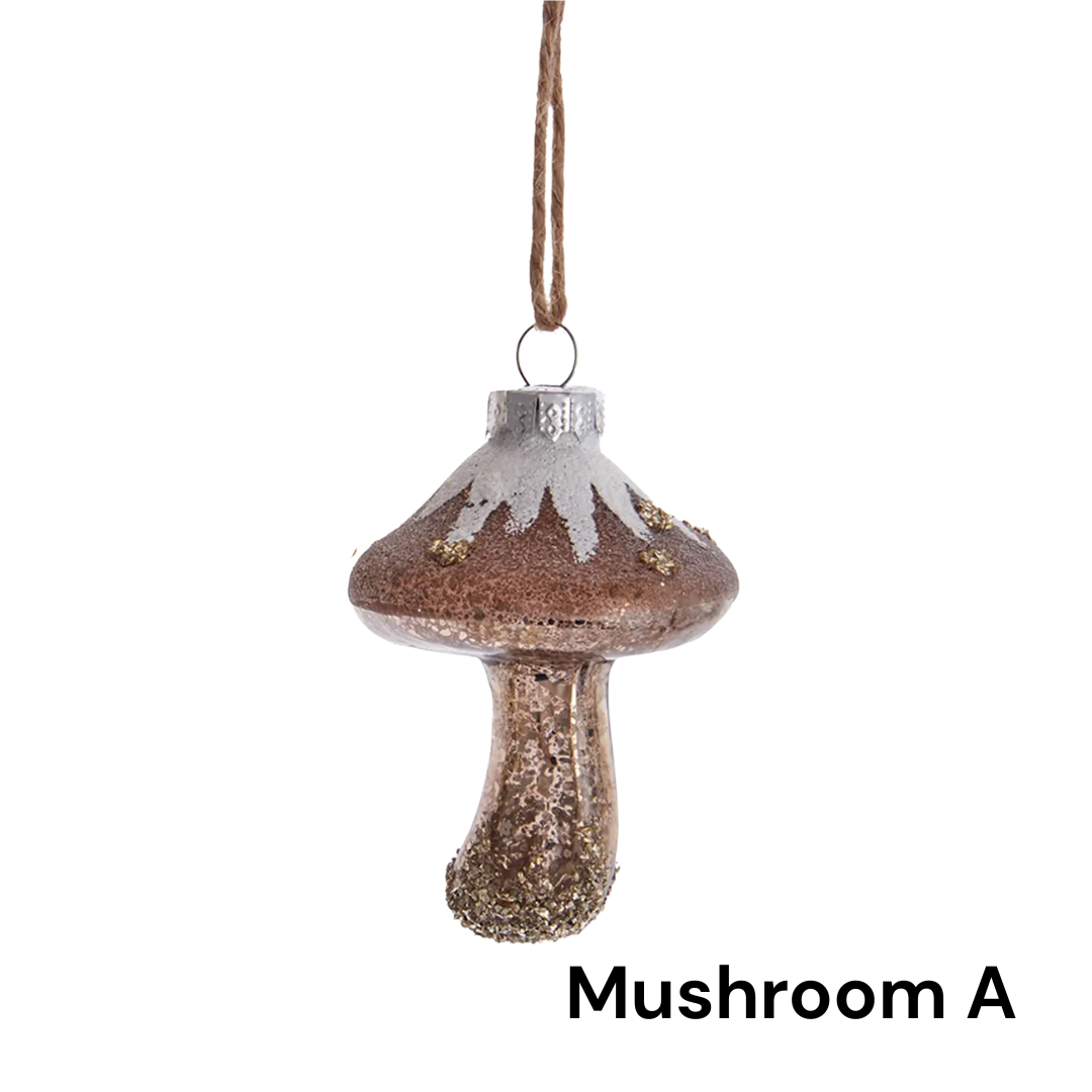 Decorative mushroom ornament with glittery texture on a white background